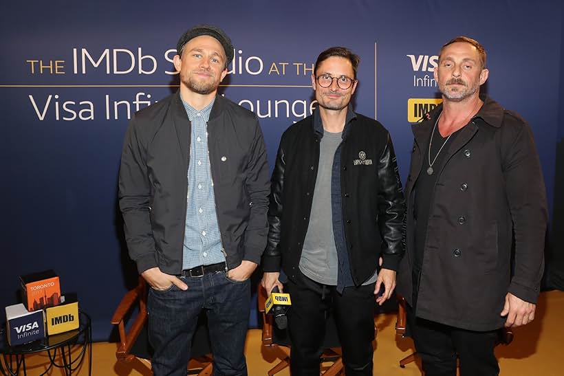 Charlie Hunnam, Michael Noer, and Roland Møller