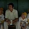 Walter Matthau, Chris Barnes, Brett Marx, and David Stambaugh in The Bad News Bears (1976)