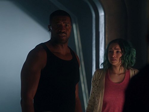 Roger Cross and Jodelle Ferland in Dark Matter (2015)