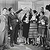 Oliver Hardy, Alice Cooke, Baldwin Cooke, Clara Guiol, Ham Kinsey, Stan Laurel, Dorothy Layton, and Venice Lloyd in Chickens Come Home (1931)