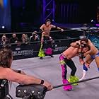Chris Jericho, Nick Massie, Aubrey Edwards, Matt Massie, and Maxwell Friedman in All Elite Wrestling: Revolution (2021)