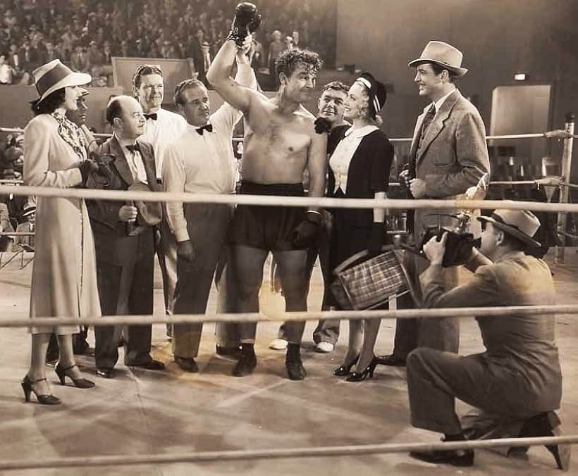 Lynn Bari, Chester Clute, June Gale, Tom Kennedy, Larry McGrath, Michael Whalen, and Guinn 'Big Boy' Williams in Pardon Our Nerve (1939)