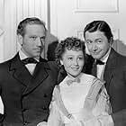 Robert Young, Melvyn Douglas, and Luise Rainer in The Toy Wife (1938)