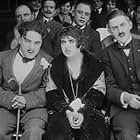 Charles Chaplin, Charley Chase, and Mabel Normand in Tillie's Punctured Romance (1914)