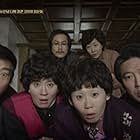 Lee Il-hwa, Sung Dong-il, Ra Mi-ran, Choi Moo-seong, Kim Seong-gyoon, and Kim Sun-young in Reply 1988 (2015)