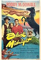 Roddy McDowall, Kirby Grant, and Lyn Thomas in Black Midnight (1949)