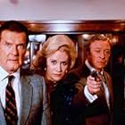 Michael Caine, Sally Kirkland, and Roger Moore in Bullseye! (1990)