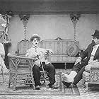 Charles Chaplin, Eric Campbell, and Edna Purviance in The Cure (1917)