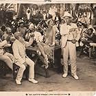 Sidney Bracey, Marion Byron, George Fawcett, Gladden James, Dorothy Mackaill, Jed Prouty, and Milton Sills in His Captive Woman (1929)