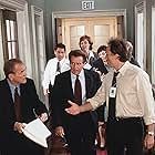Rob Lowe, Martin Sheen, Allison Janney, Moira Kelly, John Spencer, Bradley Whitford, Kevin Foley, and Mandy Hampton in The West Wing (1999)