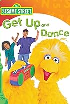 Desiree Casado, Caroll Spinney, and Big Bird in Sesame Street: Get Up and Dance (1997)