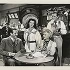 Lon Chaney Jr., Iris Adrian, Harry Antrim, Lee Bowman, and Peggy Ryan in There's a Girl in My Heart (1949)