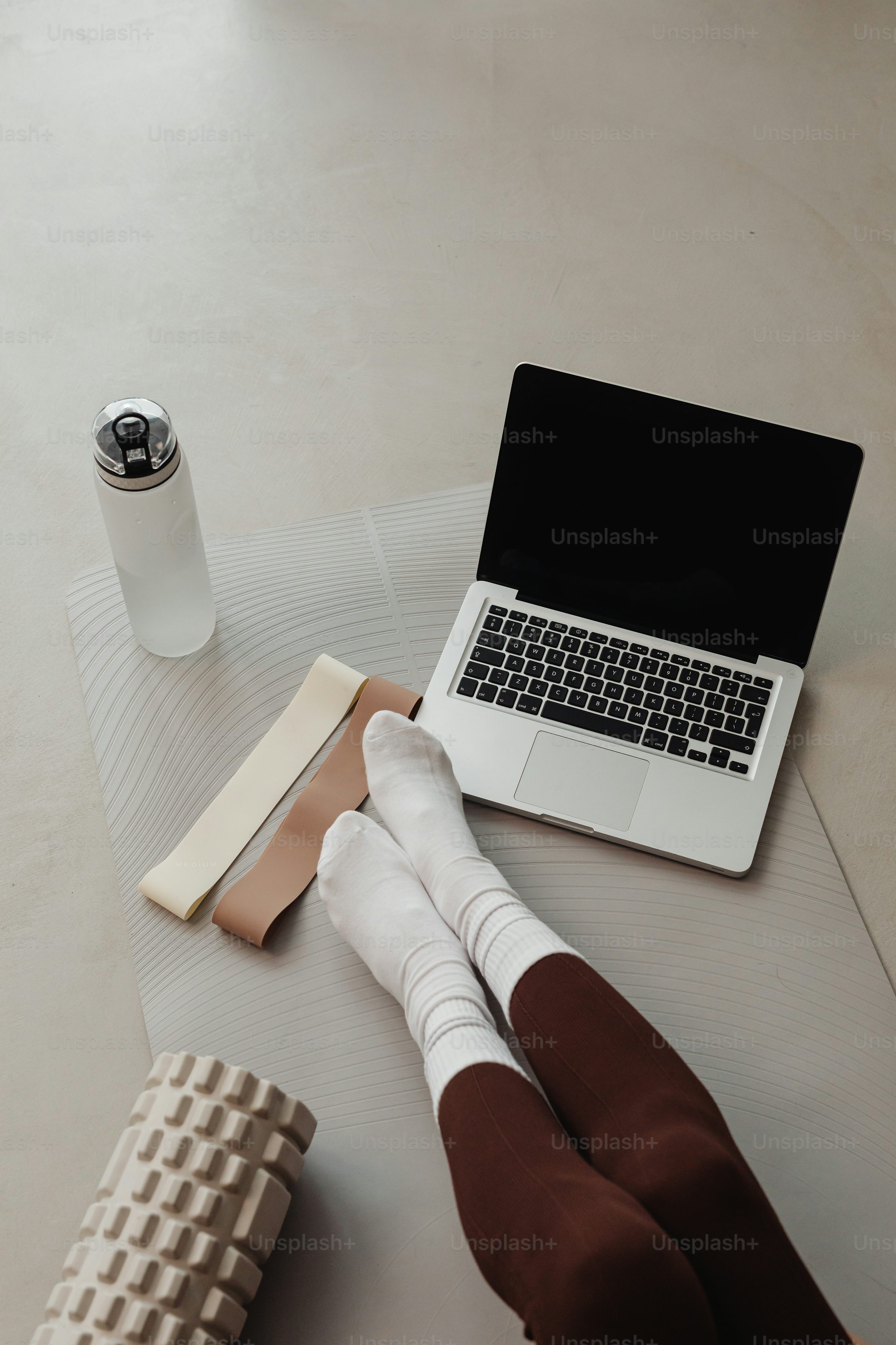 a laptop computer sitting on top of a table