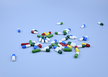 scattered pills on blue background, Doctors, Treatment, Disease Background image