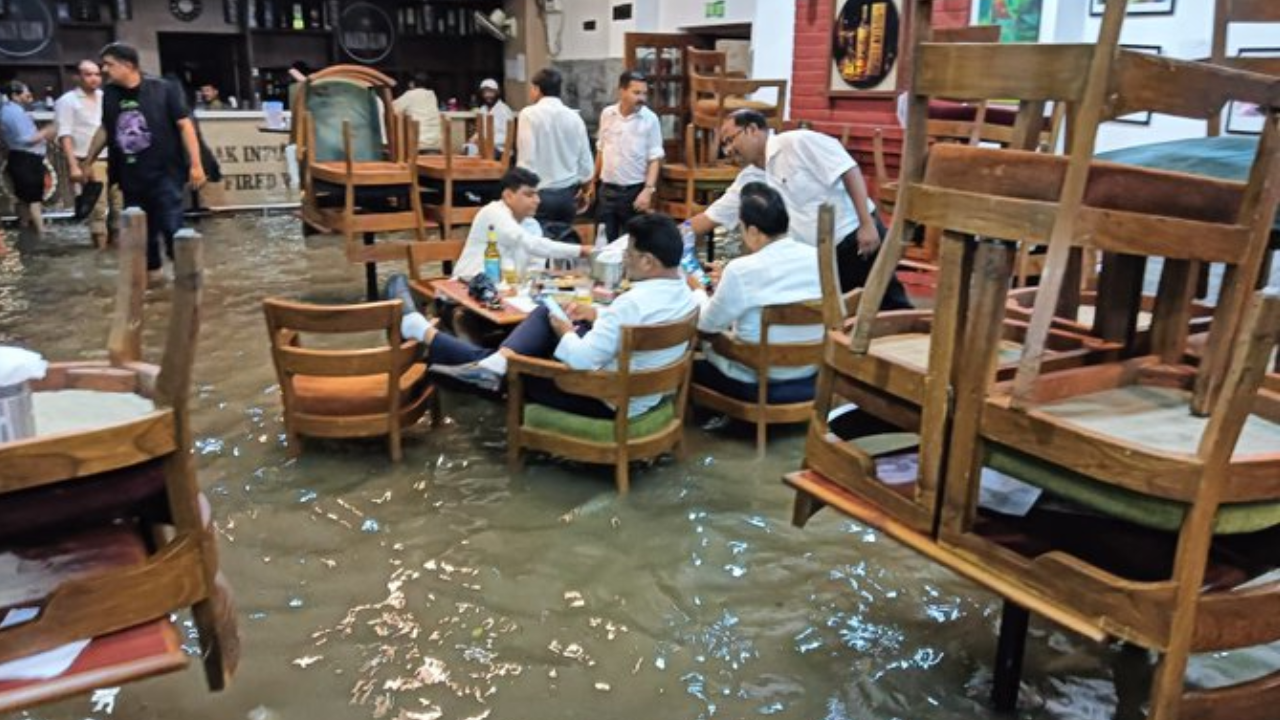 Journalists Drinking and Eating in Underwater Food Area Press Club of India Waterlogged in Delhi Pic Goes Viral
