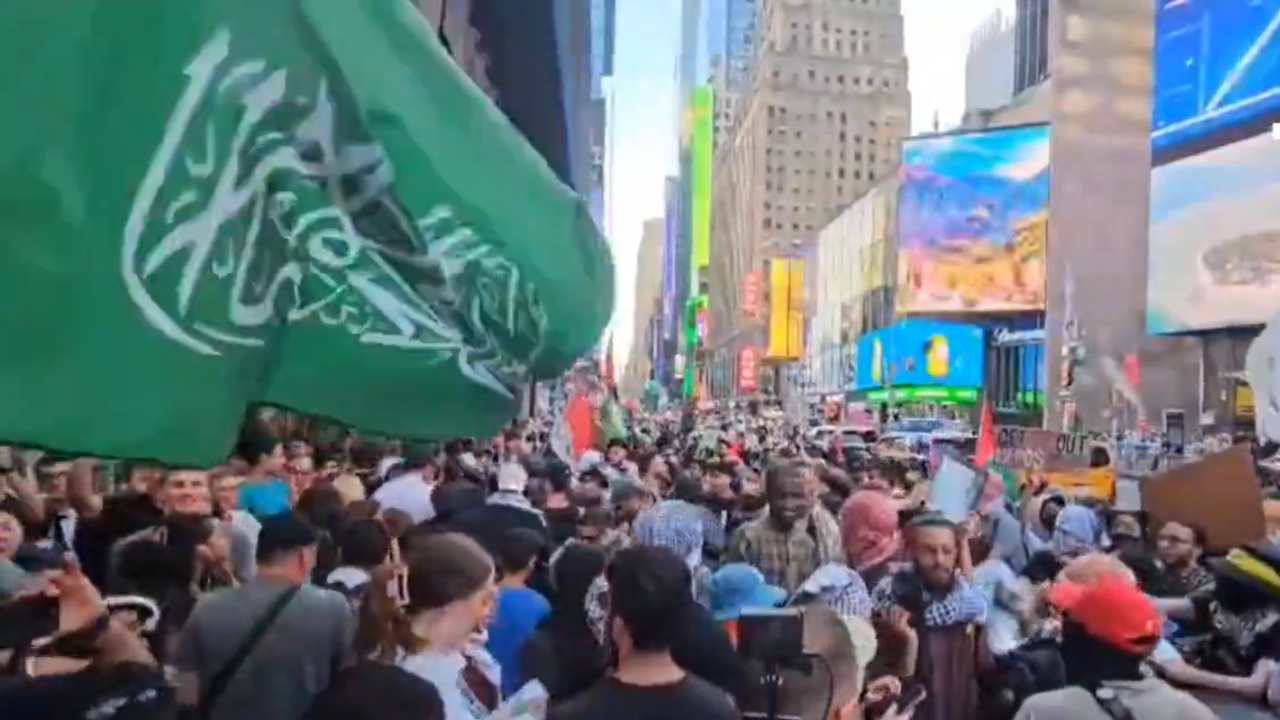 WATCH Hamas Flag Waved In New Yorks Times Square By Protestors After Haniyehs Death