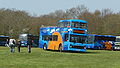 Southern Vectis 639 Steephil Cove (R739 XRV), a Volvo Olympian/Northern Counties Palatine. It was on display, until it had to go and replace 637 from Bustival Shuttle duties, after 637 broke down. It is seen here driving across the field to leave the show, heading to rescue 637.}}