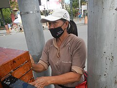 0103Sanitation workers cleaning clay brick fences Baliuag Glorietta Park 31.jpg