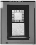 Interior, detail closeup shot of window with stained glass inserts in top southeast room taken from ther west - J. Weingartner and Son Cigar Factory, 414 East Walnut Street, North HABS PA,46-AMB,13-10.tif