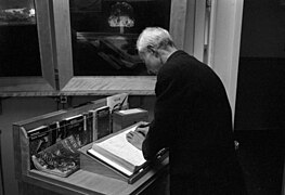 J. Robert Oppenheimer signing LANL museum guestbook.jpg