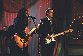 Photograph of Tracy Chapman and Eric Clapton Performing at a White House Special Olympics Dinner - NARA - 6037507.jpg