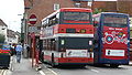 English: Wilts & Dorset 3164 (W164 RFX) (left) and 3160 (T160 ALJ) (right), both DAF DB250/Optare Spectras, in Salisbury bus station, Salisbury, Wiltshire.