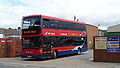 English: Wilts & Dorset 1141 (HF09 BKA), a Scania OmniCity, turning out of the company's depot in Salisbury, Wiltshire, onto Castle Street.