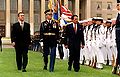 Reviewing troops at the Pentagon with Malaysian deputy premier Anwar Ibrahim, 1998.