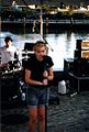 Linda Hopper (singer) and Mark Posgay (drummer) performing with Magnapop at an outdoor gig in Providence, Rhode Island, United States on 1996-08-08