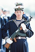 People's Liberation Army Navy sailor with type 56 assault rifle.jpeg