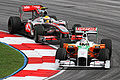 Hamilton pursuing Adrian Sutil at the Malaysian GP