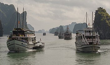 Boats cruising Ha Long Bay