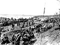 Men and equipment on Tinian beach.