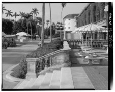 West porch of clubhouse. Southern staircase in mid-ground. Northern section of grandstands in background- CD-N. - Hialeah Park Race Track, East Fourth Avenue, Hialeah, Miami-Dade HABS FLA,13-HIAL,1-15.tif