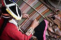 Woman weaving, Peru