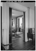 INTERIOR VIEW, LOOKING SOUTHEAST FROM DEN THROUGH THE POCKET DOORS INTO THE DINING ROOM AND THROUGH TO THE LIVING ROOM - McEwen House, 4106 Gallatin Street, Hyattsville, Prince HABS MD,17-HYATV,5-11.tif