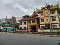 Streetview in downtown Yangon, corner Anawratha Road/51st Street, Sri Devi temple on the left, August 2013