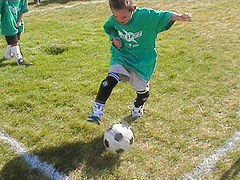 Kid playing soccer.jpg