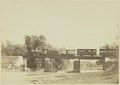 1900s - Train of the Netherlands Indies Railways (NIS) on a railway bridge over the Kali Pepe near Soerakarta