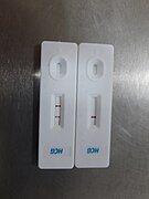 Urine Pregnancy test positive and negative devices.jpg