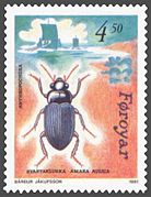 Svartalukka - black beetle (Amara aulica) illustrating anthropochora (plants and animals imported by humans), in this case the Vikings. (Faroese stamps 1991).