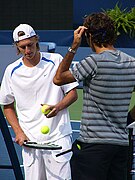 Peter Polansky practising with Roger Federer at the 2008 Rogers Cup.jpg