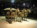 Four bronze horses with a bronze chariot. The horses are scaled down from their real life counterparts.
