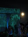 Revelers dance at the centre of the henge 3