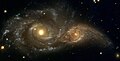 "NGC2207+IC2163.jpg" by User:Tryphon