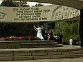 Wedding couple at war memorial, Vologda, Russia