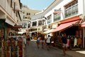 * Nomination Peligro street in Torremolinos, showing the shops and stalls and tourists walking down to the beach. --Extua 16:21, 23 July 2021 (UTC) * Decline  Oppose Sorry, noise, sharpness low, composition could be better. And: Why TIFF for this kind of photograph? --XRay 05:23, 24 July 2021 (UTC)  Comment I understand, but to answer the question this was taken on 35mm film and the TIFF is direct from scanner. Extua 06:08, 24 July 2021 (UTC)  Comment I'm scanning old photographs too, but I develop the images with my software and afterwards (before uploading) I convert the images to JPEG format. (The original file still exists.) --XRay 06:12, 25 July 2021 (UTC)