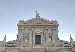 Upper part and pediment of the east facade.