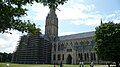 English: Salisbury Cathedral, seen in July 2009, from its North Western side, near Choristers Square. Path of the cathedral is in scaffolding for works.