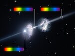 Thumbnail for File:Artist’s impression of a gamma-ray burst shining through two young galaxies in the early Universe.jpg